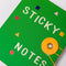 up close of green sticky note folio with white 'sticky notes' on the front with colorful shaped and gold string closure