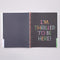 black interior pages and colorful 'i'm thrilled to be here' graphic pages