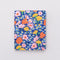 blue to-do planner with colorful pink, orange, yellow and blue floral print with 'DAILY PLANNER' across the front