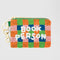 colorful checkered beaded coin pouch with white beaded 'book person' and removable gold hardware