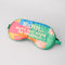 side view of colorful patchwork eye mask with cream 'shhhh...can't you hear i'm snoring?' across the front