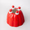 top view of red jello mold vase/planter 