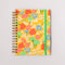 yellow large 12-month planner with green elastic closure and colorful floral print