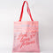 pink library card print tote bag with red 'BOOK LOVERS FOREVER' across the front