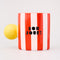 red and white vertical stripe mug with yellow ball handle and double sided typography with 'BONJOUR!' on one side and 'AU REVOIR' on the other