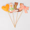 set of 4 plant stakes: orange heart, pink cowboy boot, brown horseshoe, and pink bow