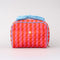 pink and red vertical stripe toiletry bag with light blue bow handle