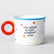 white mug that says 'you make every moment fun' with red round handle, colorful 3D dots and blue trim