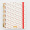 cream large 12-month planner with red cursive 'bonjour' repeated on the front, red elastic closure and gold 2027 near the bottom