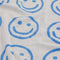 up close of light blue and periwinkle reversible smiley towel