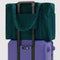 deep sea cloud carry-on on a suitcase