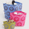 set of 3 go pouch set: small yellow with periwinkle smiley, medium hot pink with bright smiley, and large light blue with brown smiley with items inside