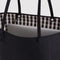 up close of black reversible tote bag