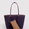 deep purple reversed side of tote with brown pouch