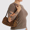 model carrying brown leopard nylon loaf bag