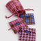 set of three standard baggus: pink tartan, blue tartan and pink houndstooth