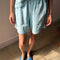model wearing sky blue cotton flared shorts and matching top