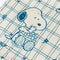 up close of white tea towel with blue fruit grid and snoopy eating cherries print