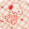 up close of white tea towel with red fruit grid and snoopy eating cherries print