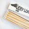 up close of white tipped long matches in a 'VERY LONG MATCHES' across the box and dachshund design