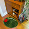 green olive shaped rug near bar cart