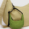green grass mini crescent bag charm on a yellow baggu bag