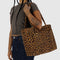 model carrying leopard small cloud carry-on bag
