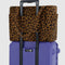 leopard small cloud carry-on bag on a suitcase