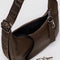 black key leash on small brown recycled leather crescent bag with monochromatic strap