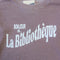 up close of rosewood sweatshirt with white Bonjour De La Bibliothèque across the front