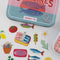 up close of pink and blue sardines ton with sardines themed washi stickers