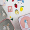 up close of stickers: cherry, strawberry, goose, lemon and photo of flowers