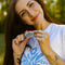 model holding cornflower 'pyrex inspired' circle hair clip