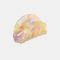 peach, pale yellow and pale purple translucent hair claw