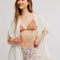 model wearing cream and brown plaid crinkle boxer shorts