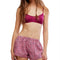 model wearing pink and red crinkle boxer lounge shorts
