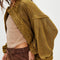side view of model wearing slouchy olive green textured open front cardigan
