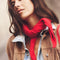 model wearing red knit triangle essential scarf