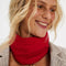 model wearing red knit triangle essential scarf