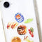 holographic apple stickers on a phone
