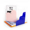 pink and blue acrylic scalloped bookends with books