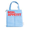 light blue color block lunch bag with 'bon appetit' across the front in red