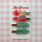 setting clips: 2 iridescent hot pink and 2 aquamarine