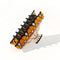 underside of orange 70's floral vintage lamp inspired hair claw