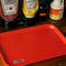 red lunch inspired tray on a table with condiments