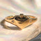 gold ring with heart shaped locket