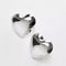 silver oversized puffy heart shaped stud earrings