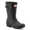 front view of short black rubber rain boots with silver buckles on the side and hunter logo on the front