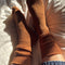 model wearing burnt brown textured fluffy socks 