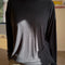 model wearing black linen blend long sleeve top